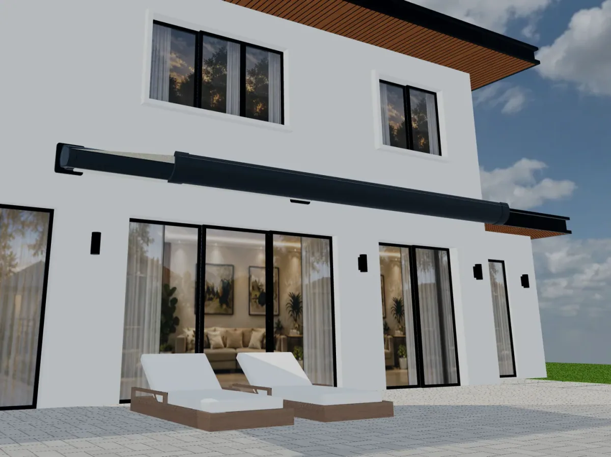 Casete de toldo retraído montado encima de las puertas del patio en el exterior de una casa